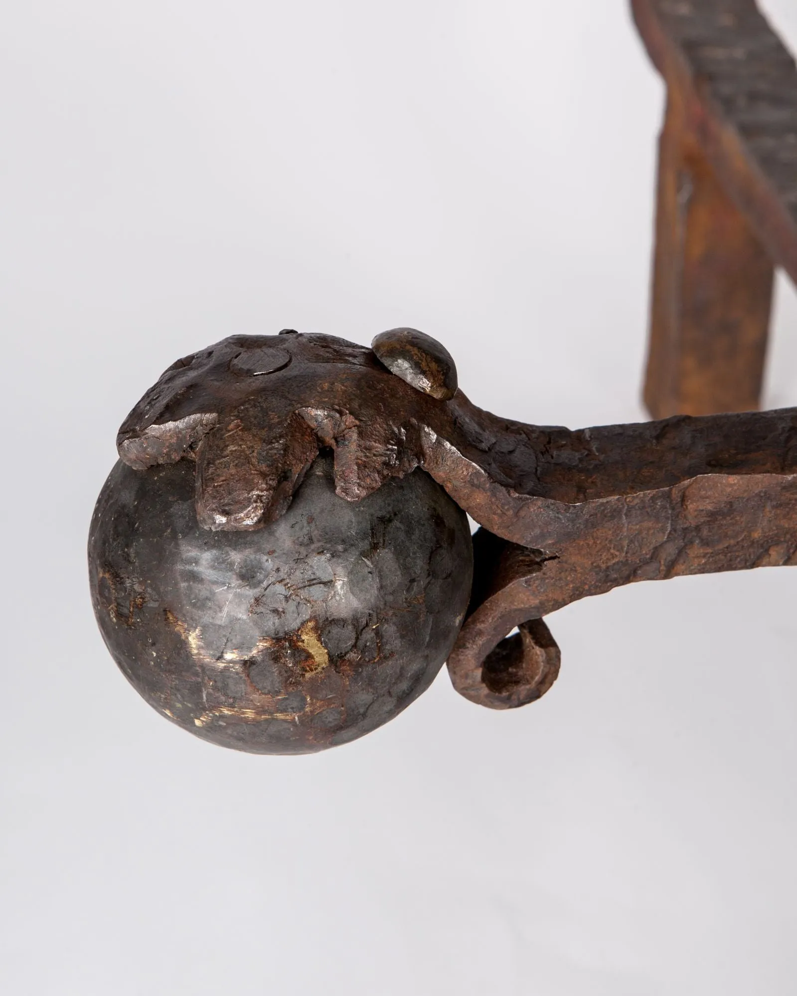 Figural Andirons with Wrought Iron Bar
